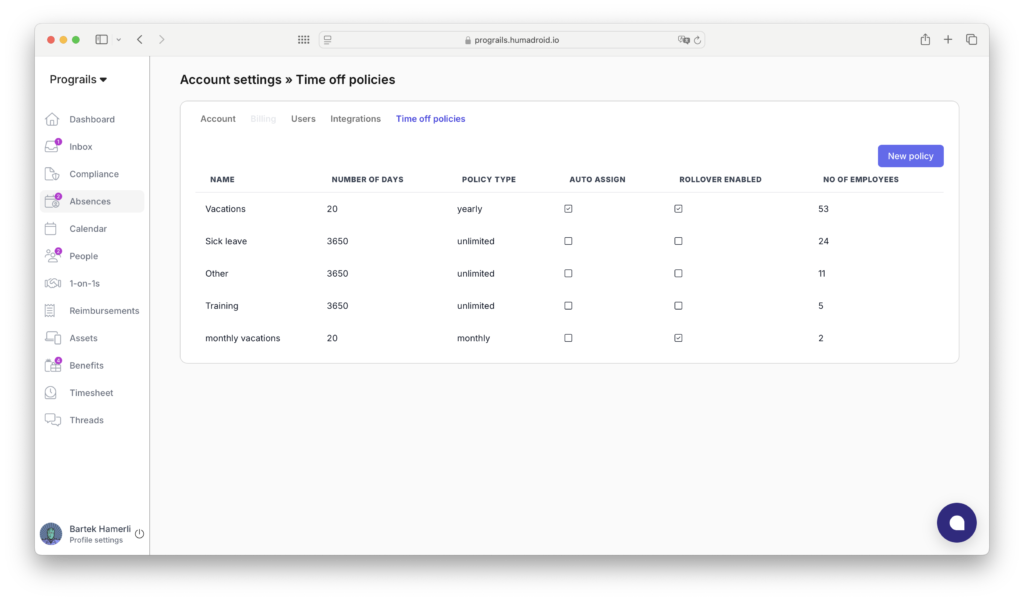 A screenshot of the Humadroid account settings interface displaying the "Time off policies" tab. The screen shows a list of different leave types, including vacations, sick leave, training, and other policies, with specified number of days, policy type (yearly, monthly, unlimited), auto-assign options, and rollover settings. The left-side menu includes sections for managing employees, calendar, absences, reimbursements, and more. In the top right corner, there is a "New policy" button, allowing users to add a new time-off policy.